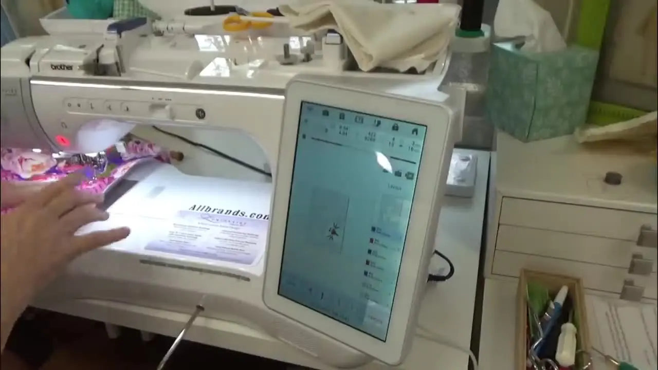 A close-up of the Brother Luminaire stitching an all-over diamond quilting pattern on the mug rug background fabric.