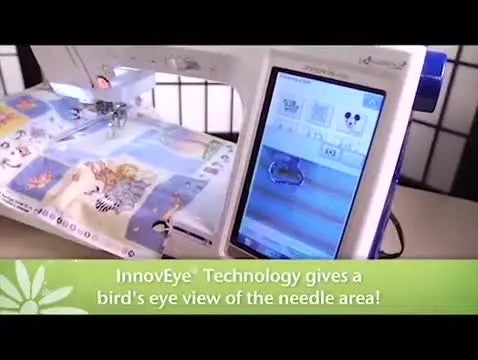 The Brother Quattro 2 LCD shows the InnovEye live camera view used to align an embroidery design precisely on hooped fabric.