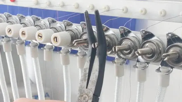Stiff Tension Knobs on a Multi-Needle Embroidery Machine? Fix the Split Post Without Stripping Threads