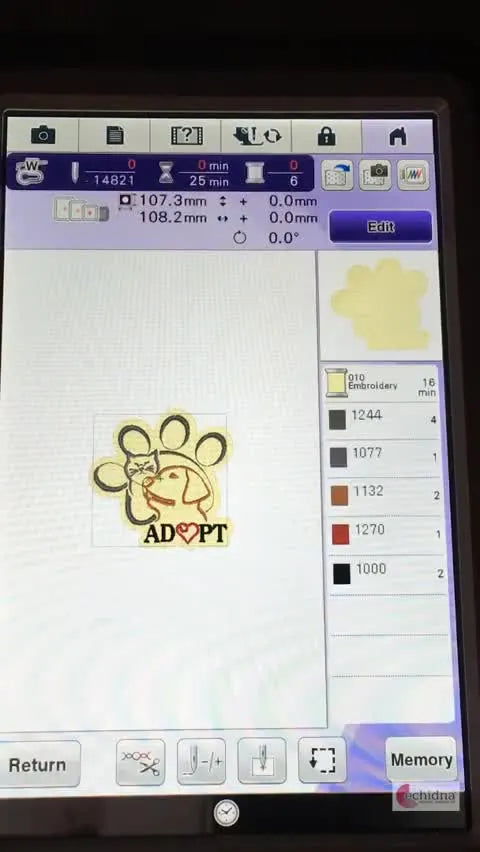 A close-up of the finished embroidery on Dalmatian-print faux fur, showing how the knockdown fill holds the pile down so the top design stays crisp.