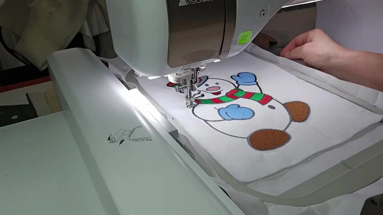 ITH Snowman Paper Towel Holder Decor on a Baby Lock: Clean Hooping, Smooth Outlines, and a Backing That Actually Hides the Mess