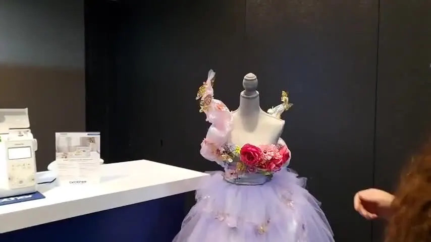 A close-up of a Brother-style 4x7 magnetic hoop clamping fabric flat, showing how magnetic bars reduce hoop marks and speed up hooping.