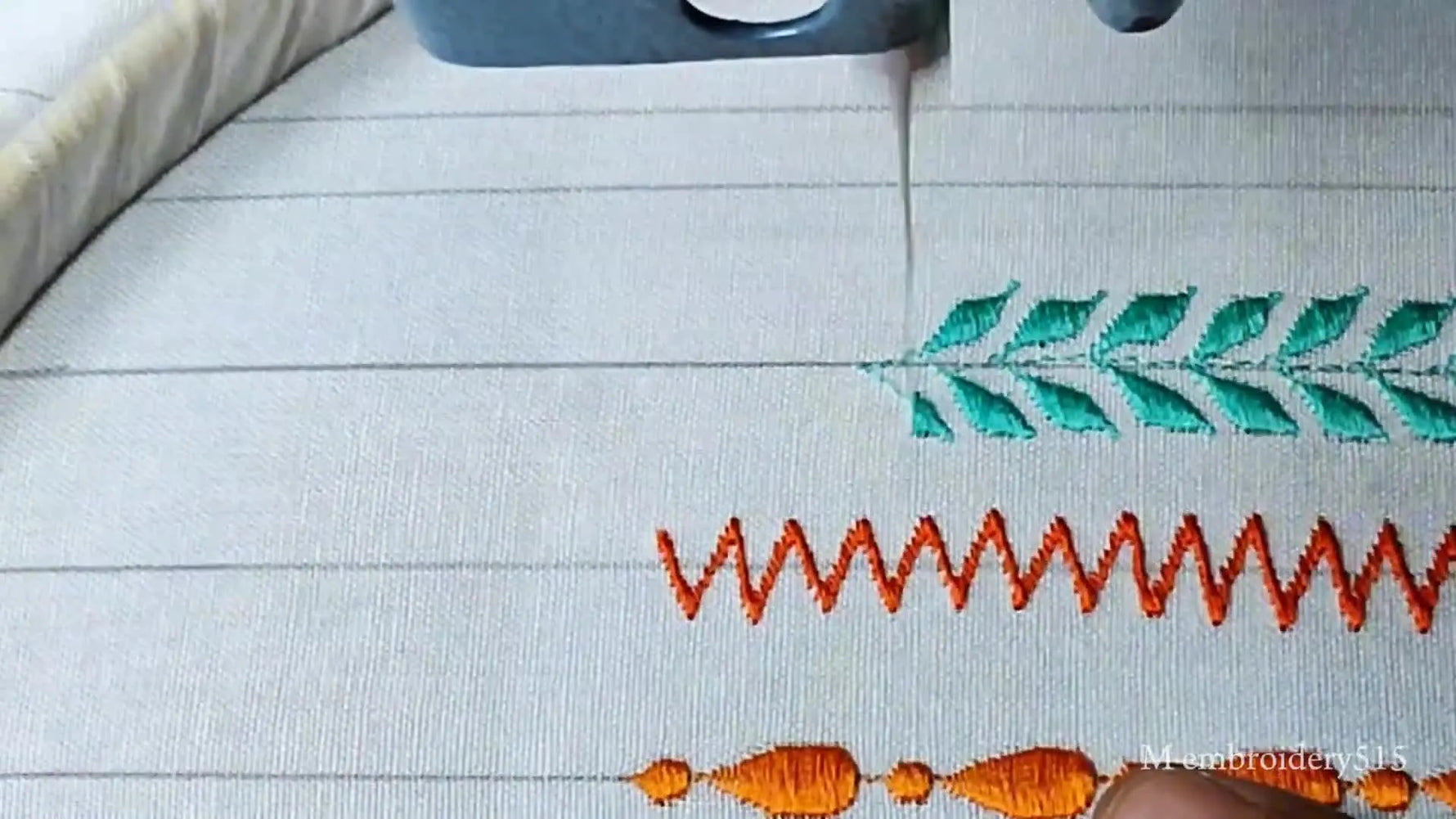 The 'leaves' zigzag pattern in teal thread, demonstrating a dense, vine-like border.