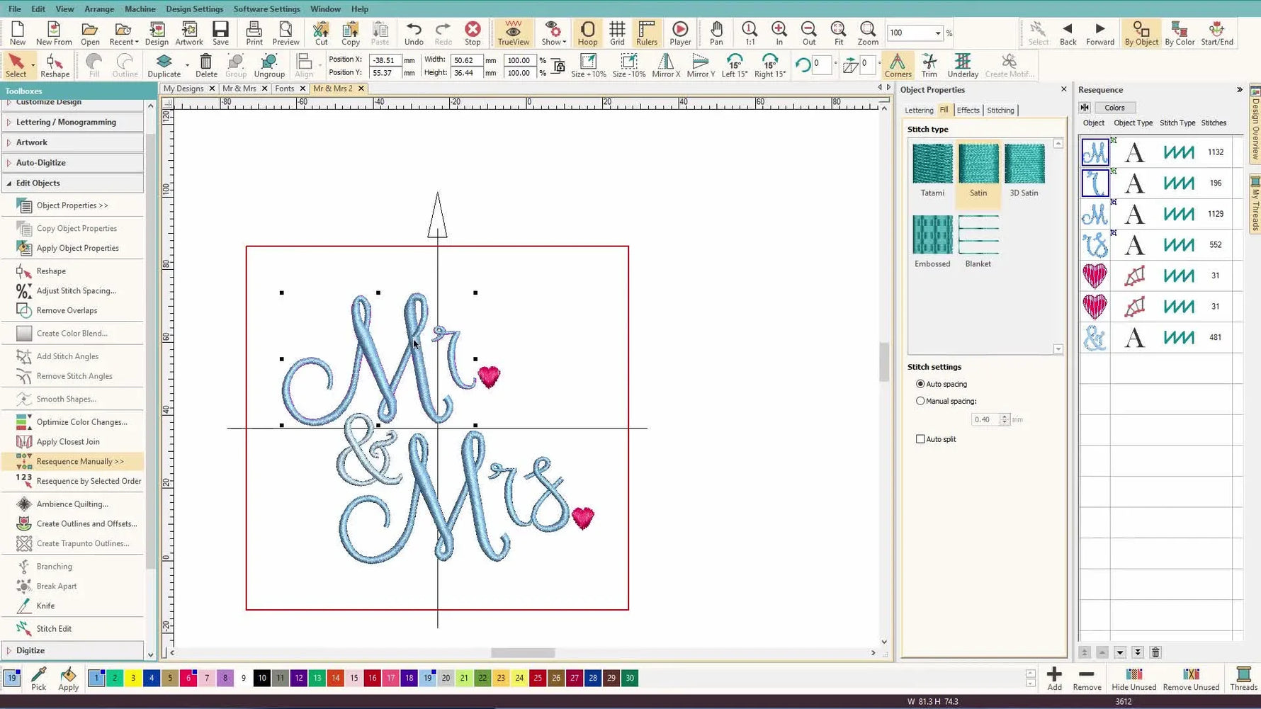 The finished “Mr. & Mrs.” embroidery layout is fully assembled with a contrasting ampersand and small heart motifs, ready for stitch simulation and export.