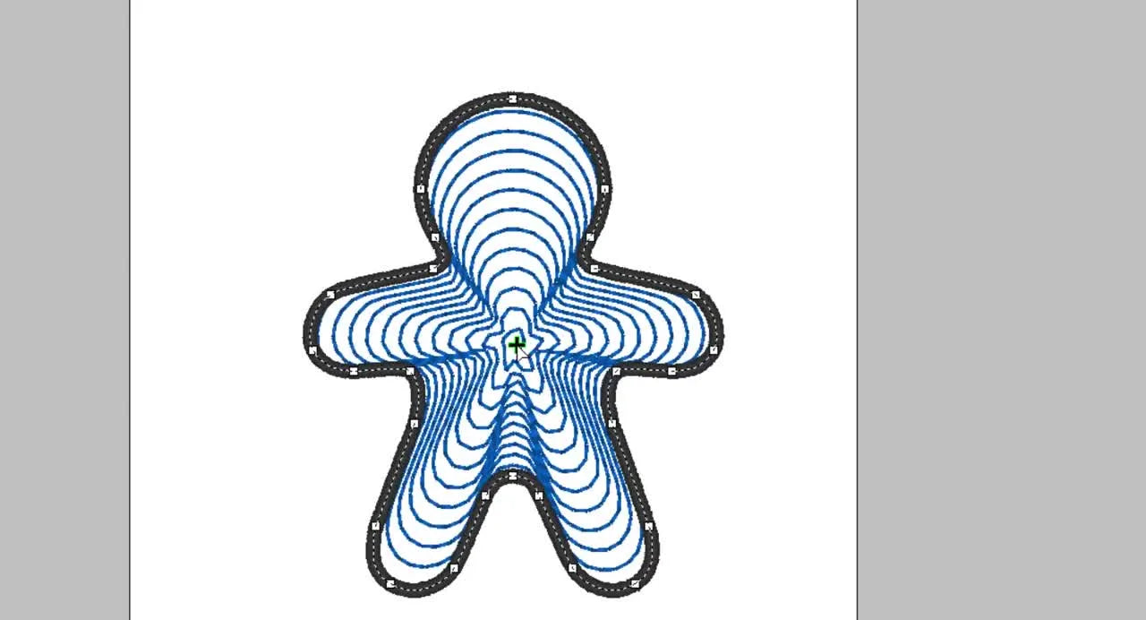 A gingerbread-man shape filled with a spiral stitch pattern, showing the green crosshair used to move the spiral’s focal point in PE-Design 11.