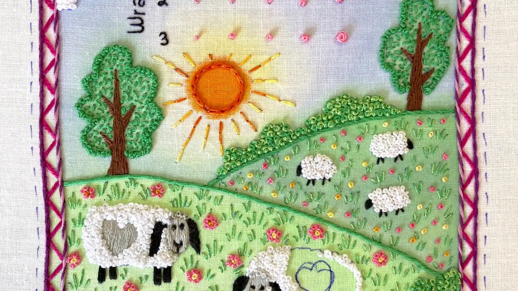 Embroidered sampler page showing French knots for sheep, clouds, trees, and sun.