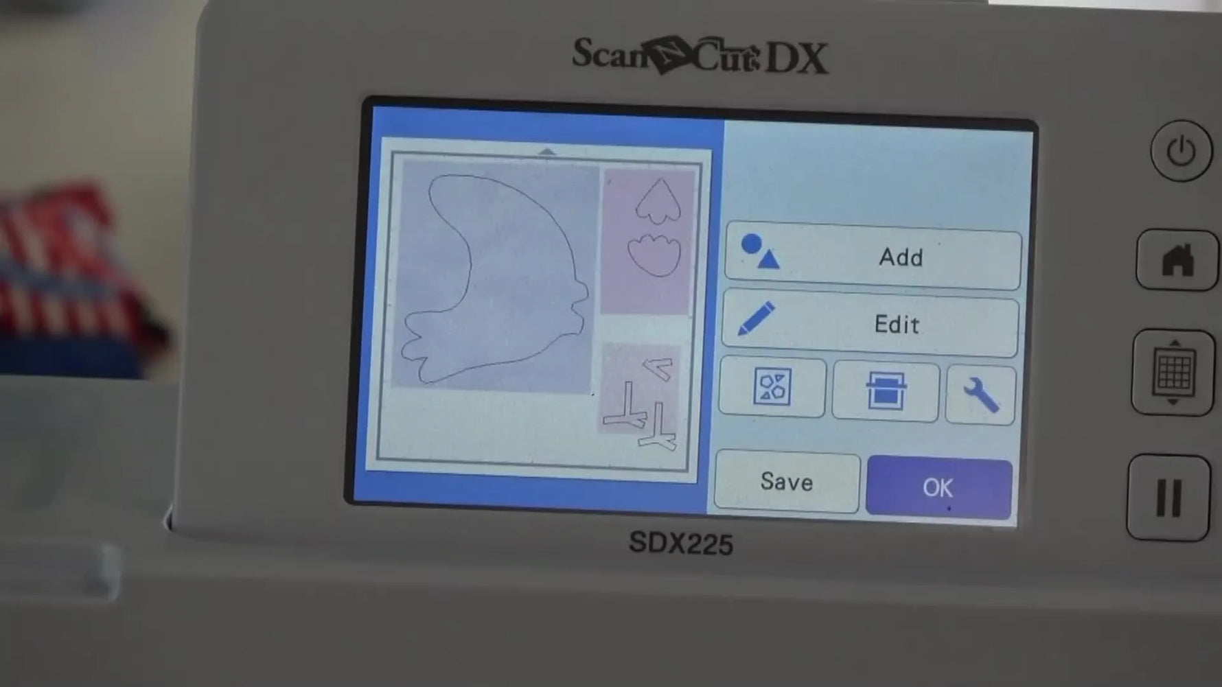 The ScanNCut screen shows the cut lines perfectly aligned over scanned fabric scraps for accurate appliqué cutting.