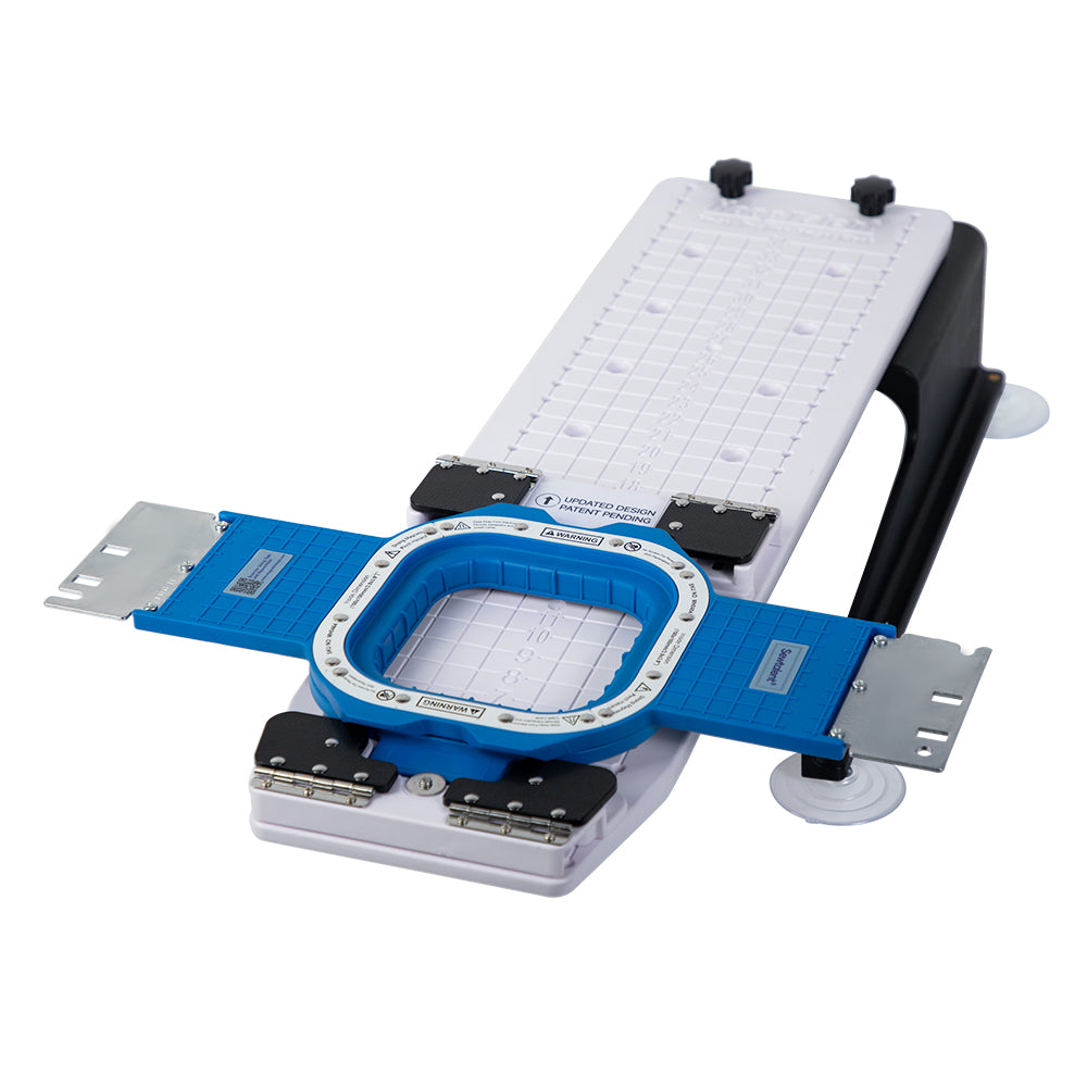 Blue 3.9-inch magnetic hoop positioned on the sleeve station